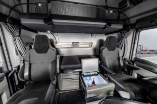 In the cabs of the new MAN TG series, the cool box is ready to hand next to the driver's seat.